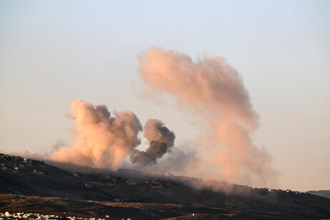 Smoke rises as a result of an Israeli airstrike on the southern Lebanese town of Al Khiam