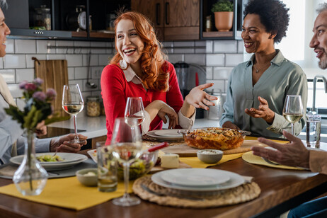 Close friends eating together