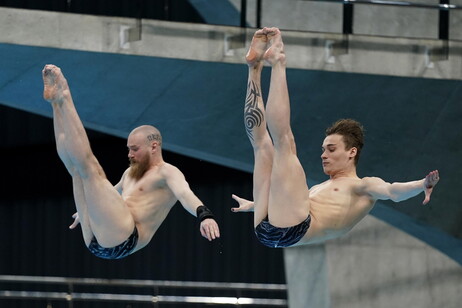 Tuffi Evgenil Kuznetsov and Nikita Shleikher of Russia in action during the men's synchronized 3m sp