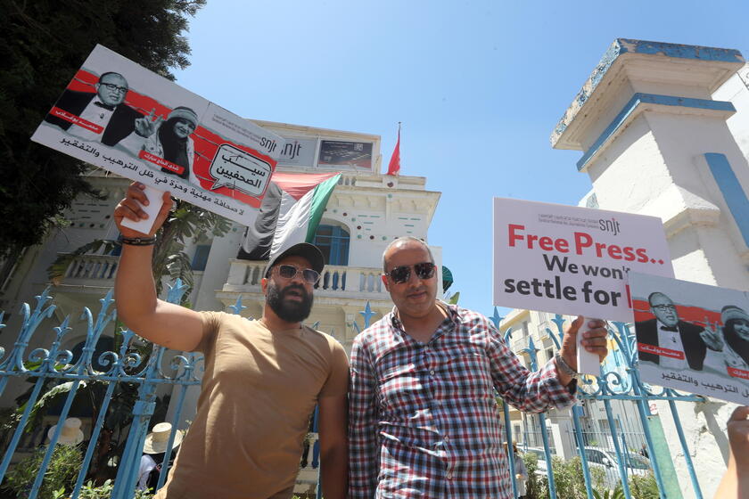 Journalists protest during a press freedom rally in Tunis