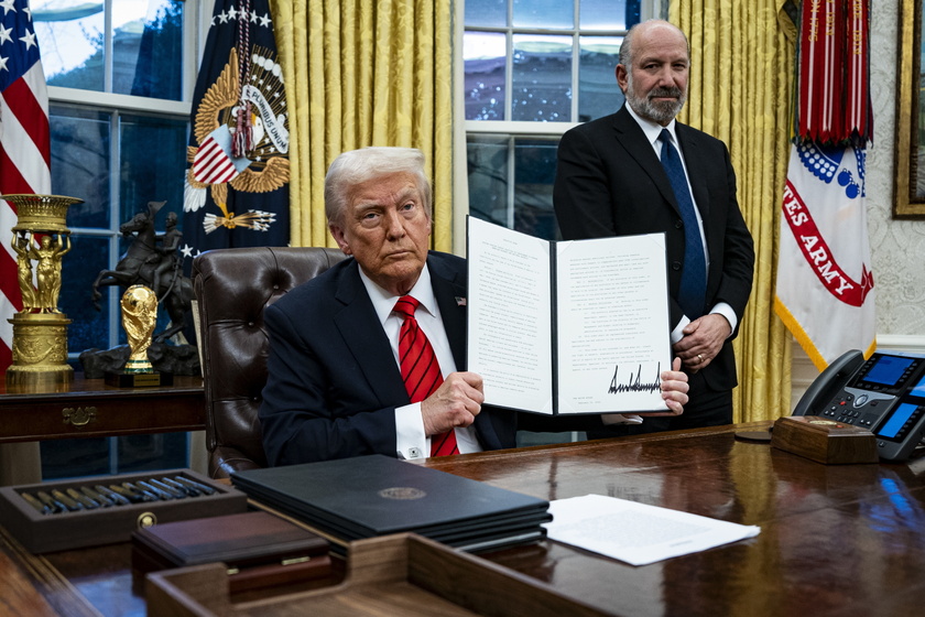 US President Trump signs executive order in Oval Office