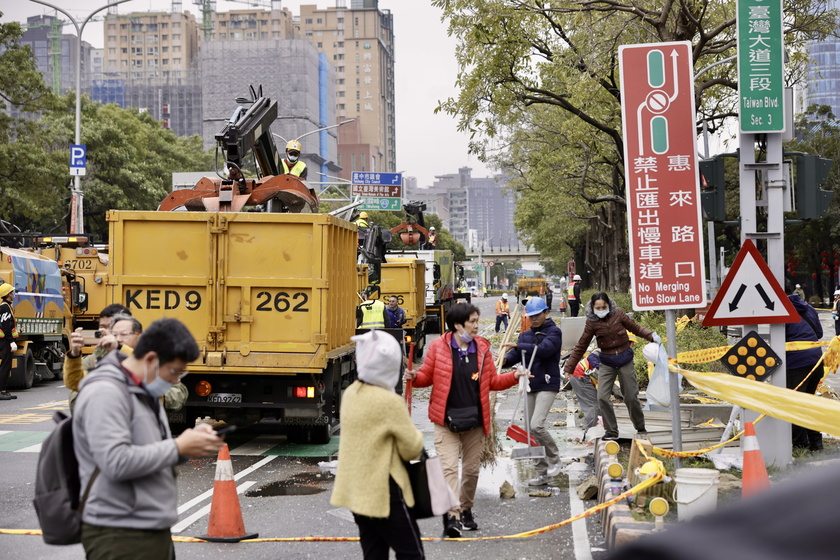 Suspected gas explosion kills at least four at a department store in central Taiwan