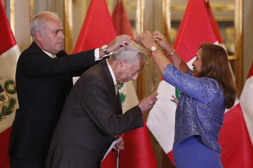 President of Peru awards the highest official decoration to writer Mario Vargas Llosa